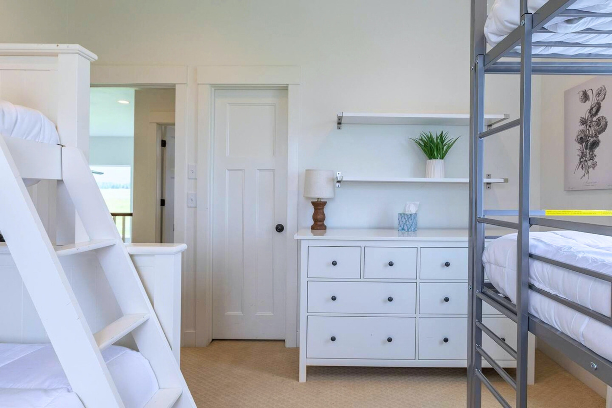 Bunk Room 1 includes a dresser for easy storage