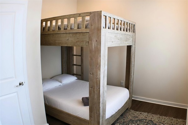 Bunk Room #1: Fun lofted beds, modern decor, and a perfect spot for adventures with friends!