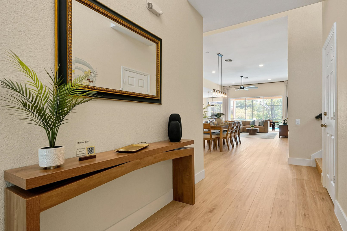 Foyer: Bright foyer leading into the spacious open-concept dining and living areas.
