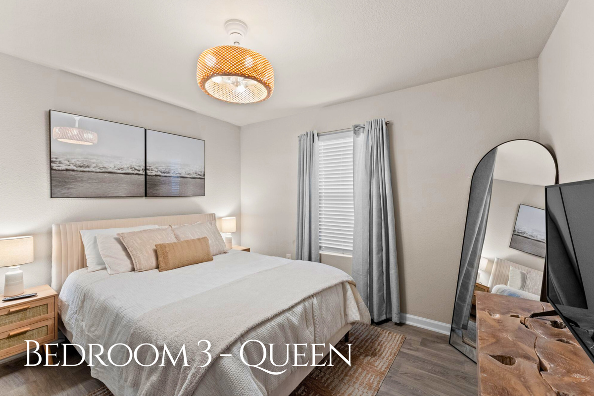 Another Queen bedroom offers a comfortable and bright, airy layout that makes settling in feel easy and effortless.