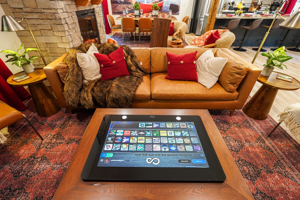 The Infinity Game Table set into a custom coffee table with dozens of your favorite games. We get sooo many positive comments about these.