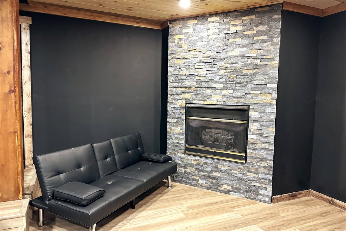 Additional Seating/Sleeper Futon Sofa and Indoor Fire Place in Theater Room. 