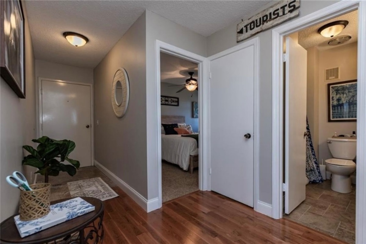 Hallway showing the entry, bedroom and bathroom