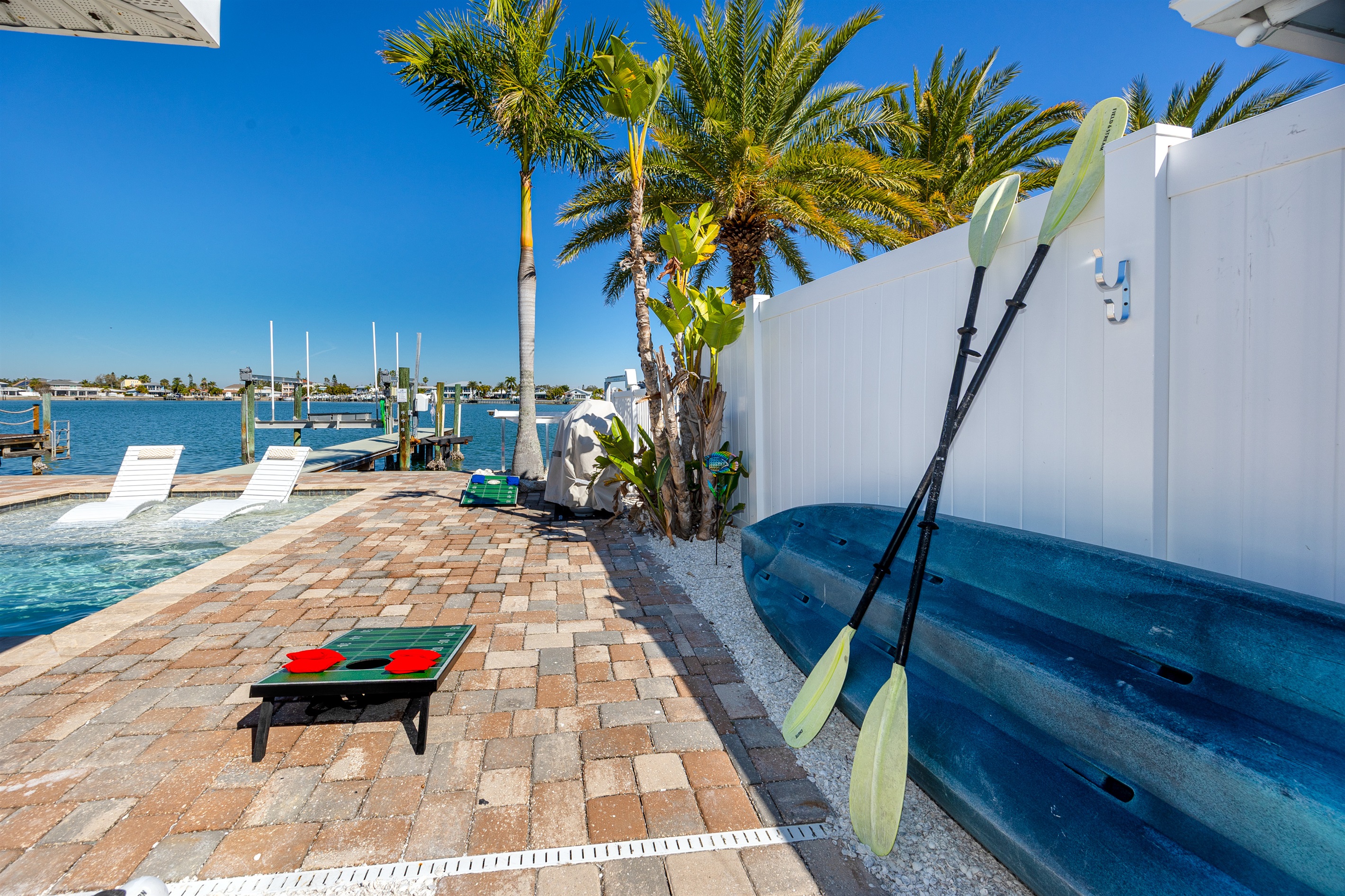 Relax in the sun, play some corn hole, or explore the water on the Kayak!
