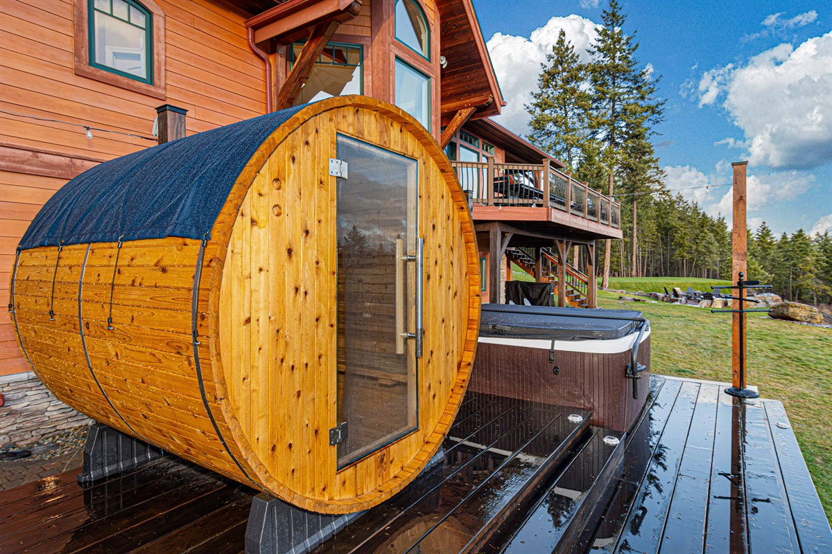 Barrel Sauna located on the back deck. Fits up to 4 people. 