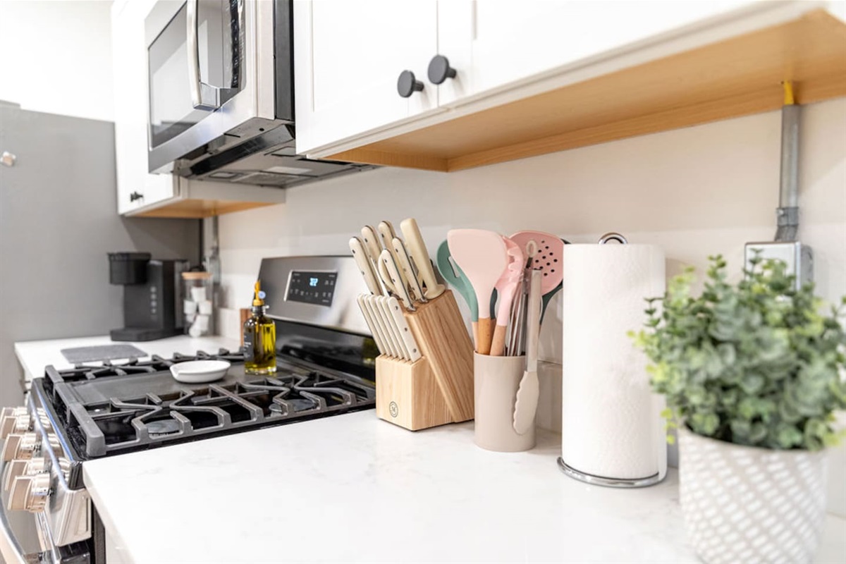 Fully stocked with essential kitchen wares, including cookware, utensils, and appliances for all your culinary needs.