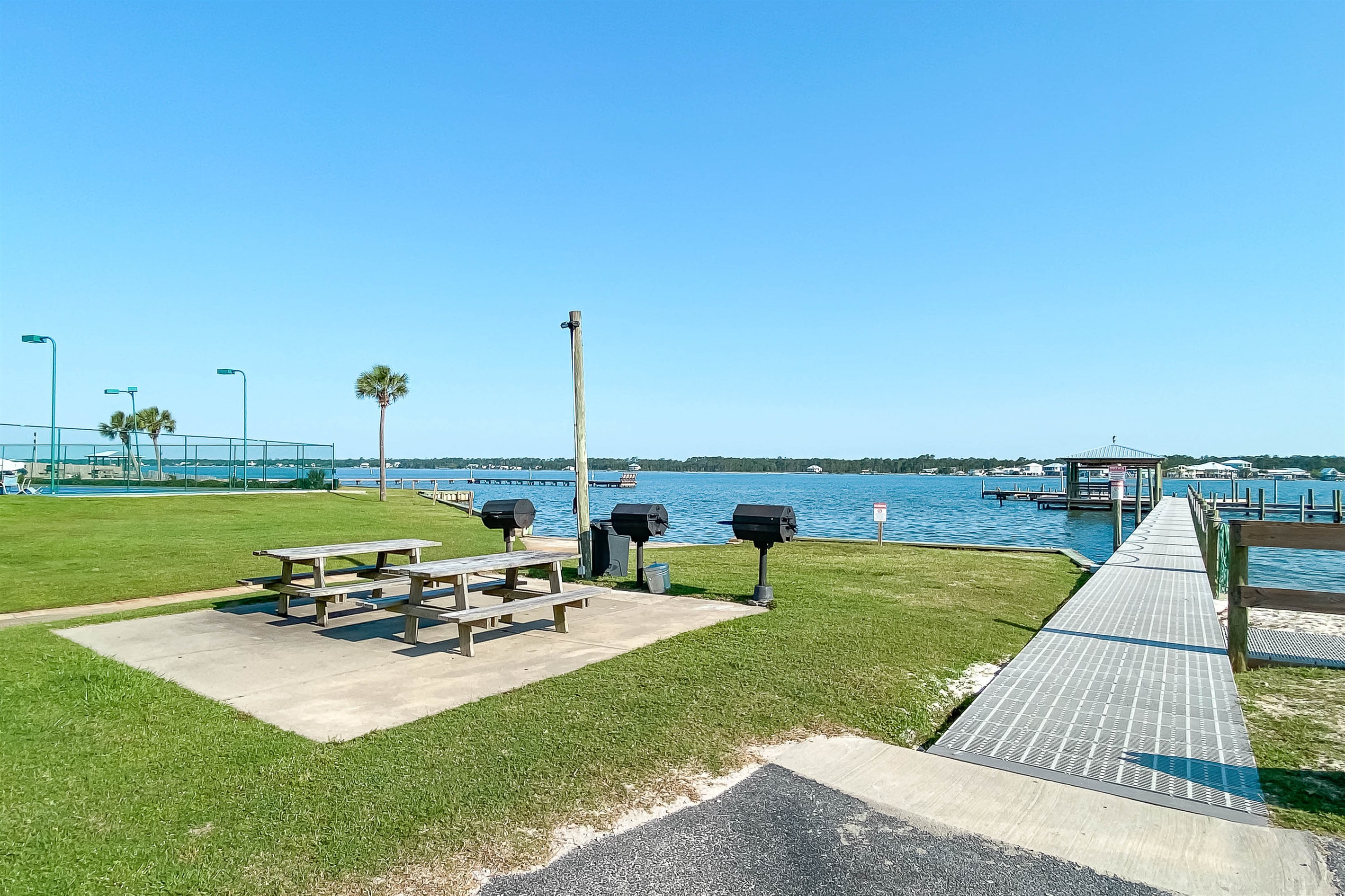 Fire up the grill at our lagoon-side BBQ area. Our picnic tables and community grills make sunset dinners a breeze.