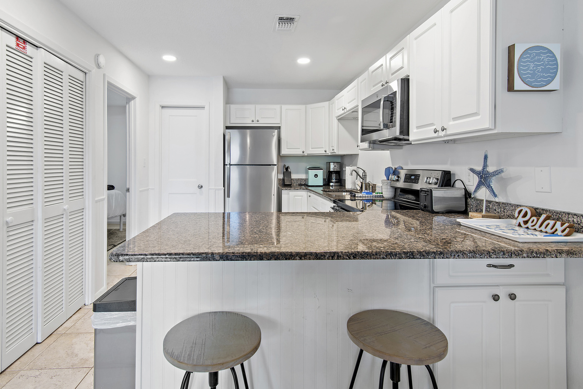 Breakfast bar with two stools