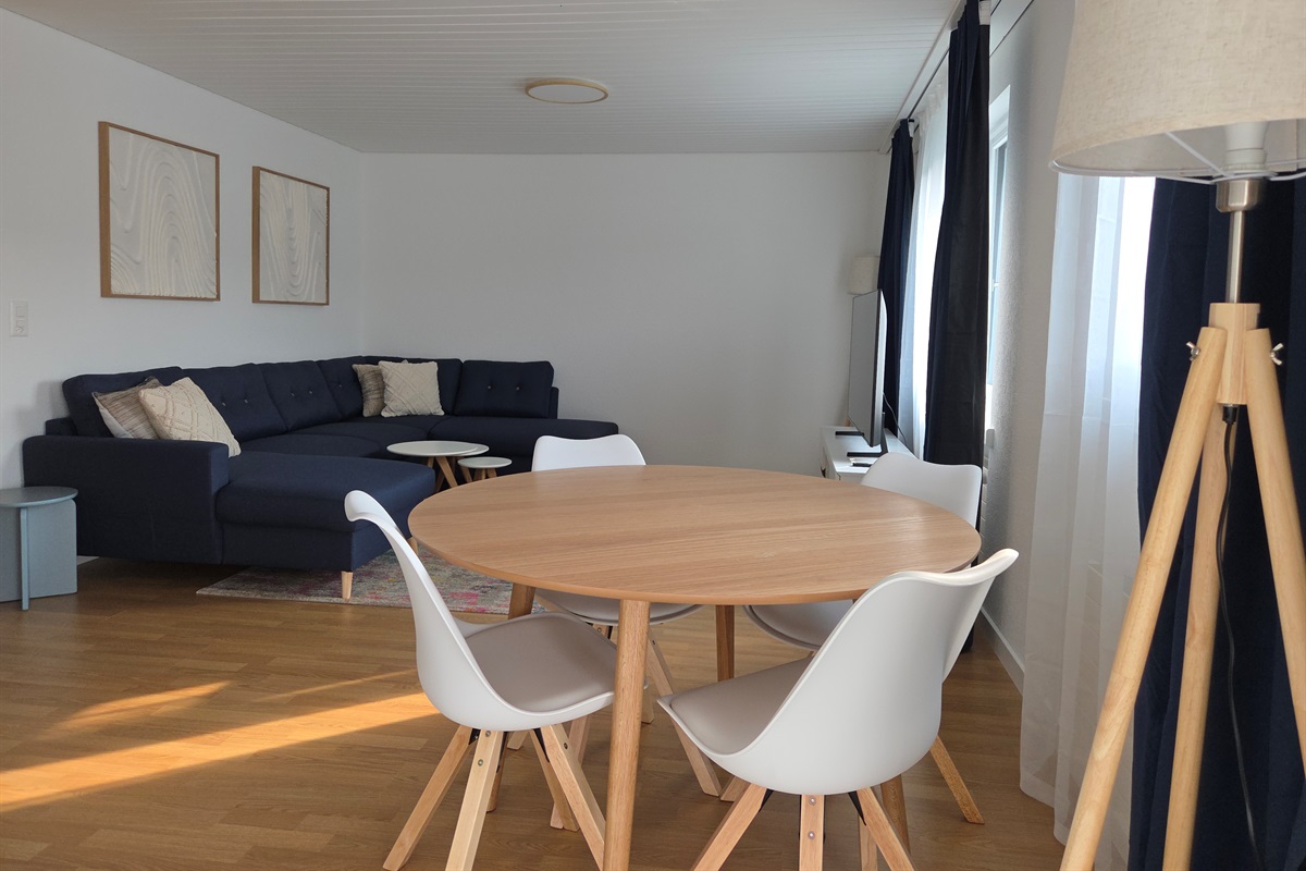 Dining area between kitchen and living room
