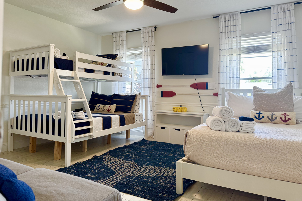 Our fifth bedroom, with a set of bunk beds (twin over full) and a Queen bed.
