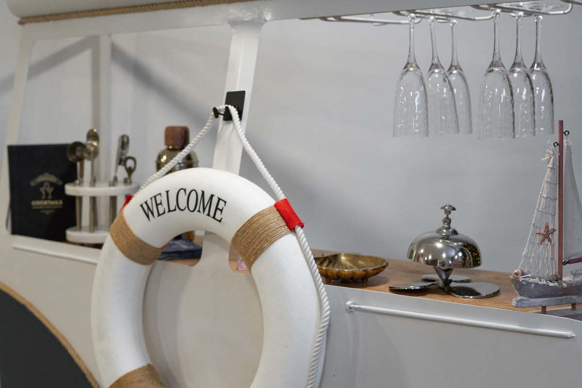 Bar close up details with nautical elements and everything you need to whip up a great drink.