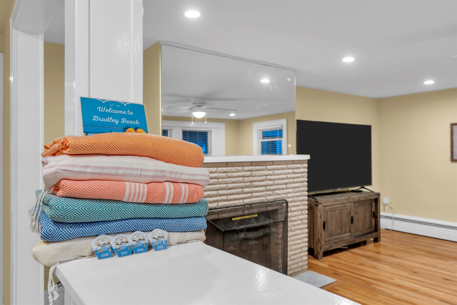 4 beach badges, and all of the beach essentials like towels, chairs and an umbrella for those beautiful beach days.