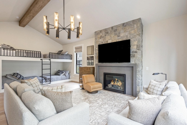 The ultimate kids’ hangout: built-in bunks, fireplace, TV lounge and arcade, all in one spacious retreat