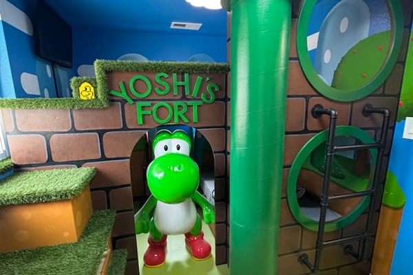 (Shown for detail --- Yoshi is fixed to the wall in the fort :)) Queen bed on top with twin-XL single bed on bottom. 