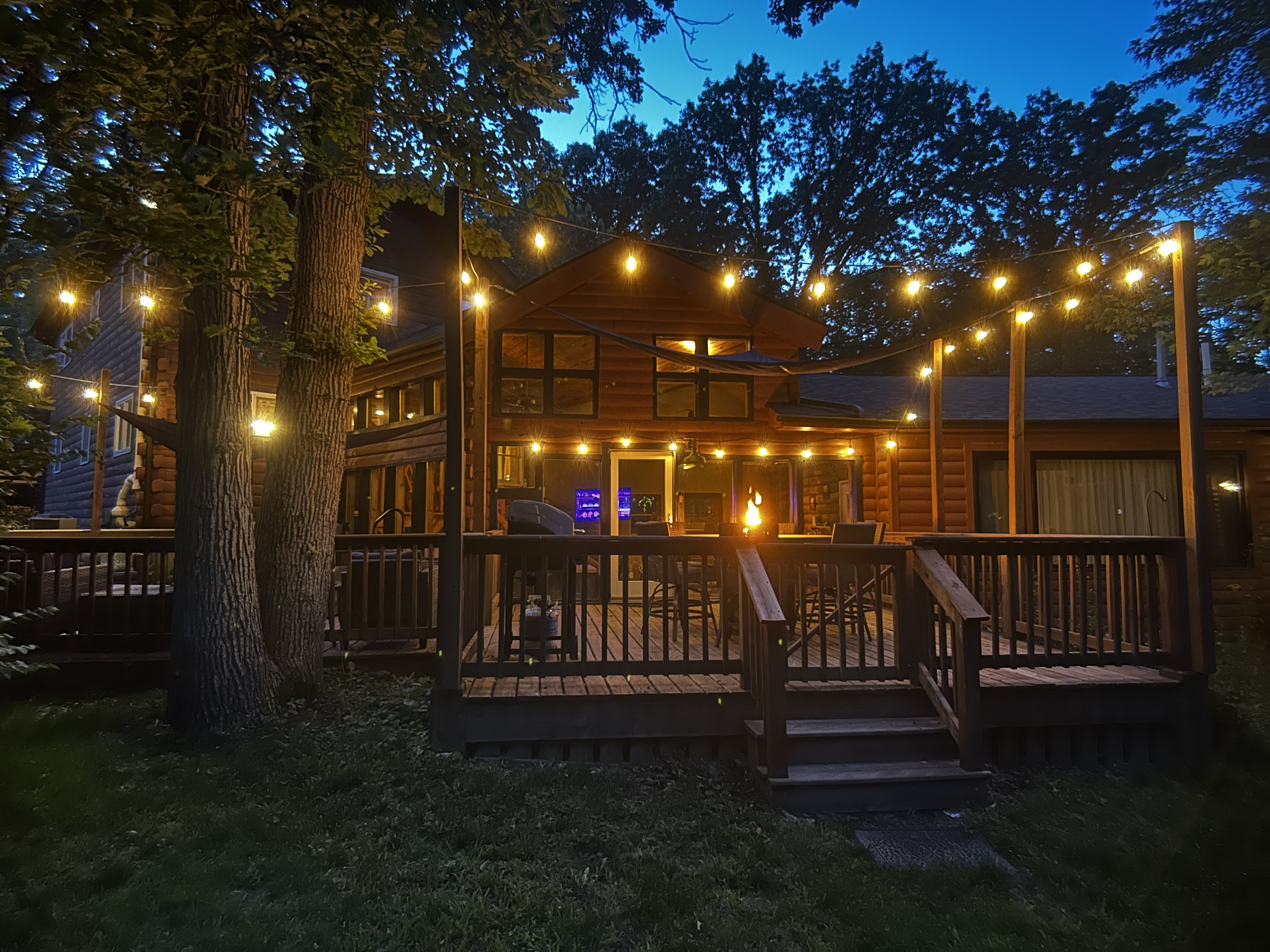 Wind down under the cozy lighting at the end of your day. Relax in the hot tub or gather around the fire table.
