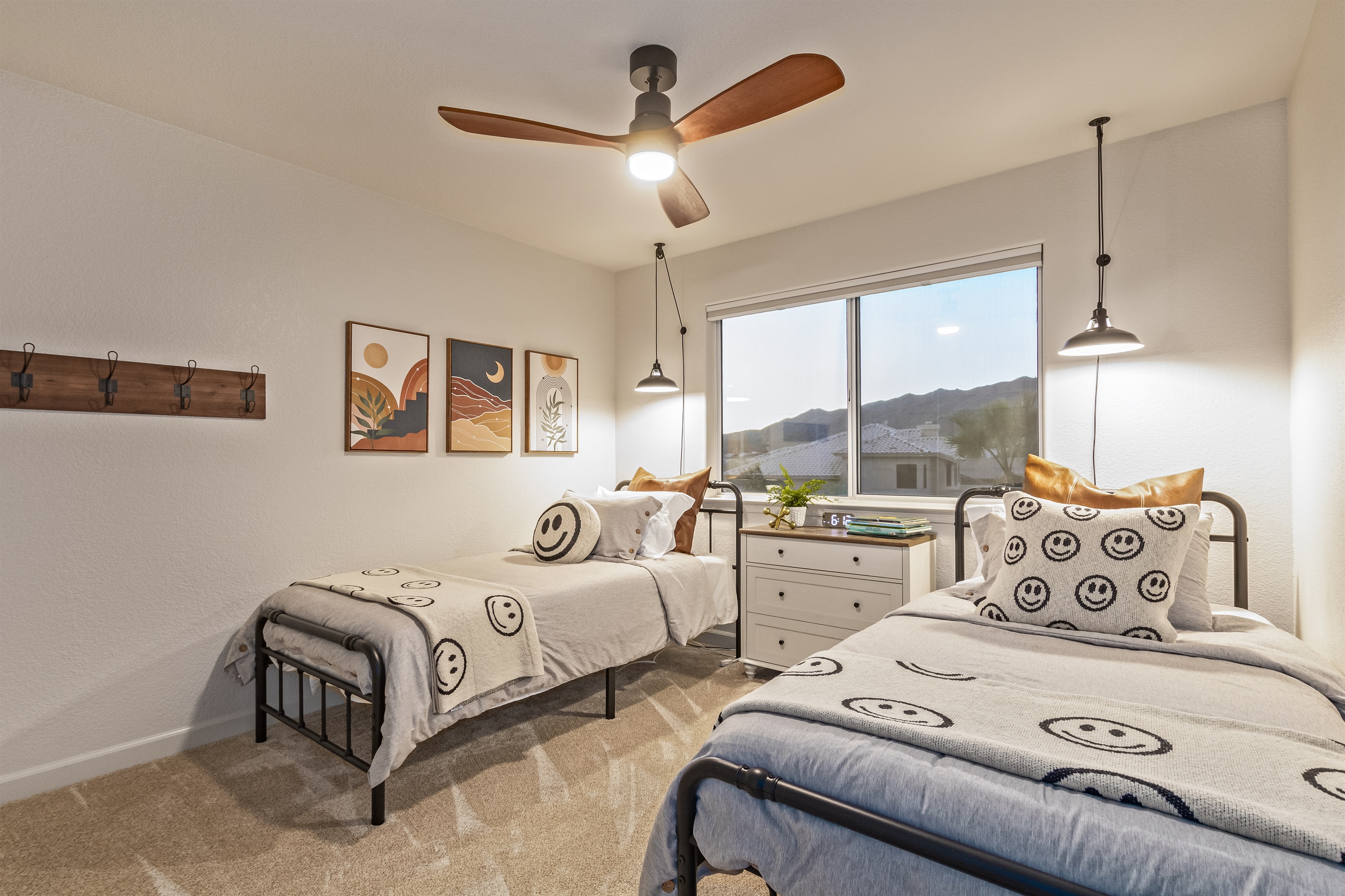 Fifth bedroom with two twin XL beds, linens, extra pillows and blankets and room darkening shades 