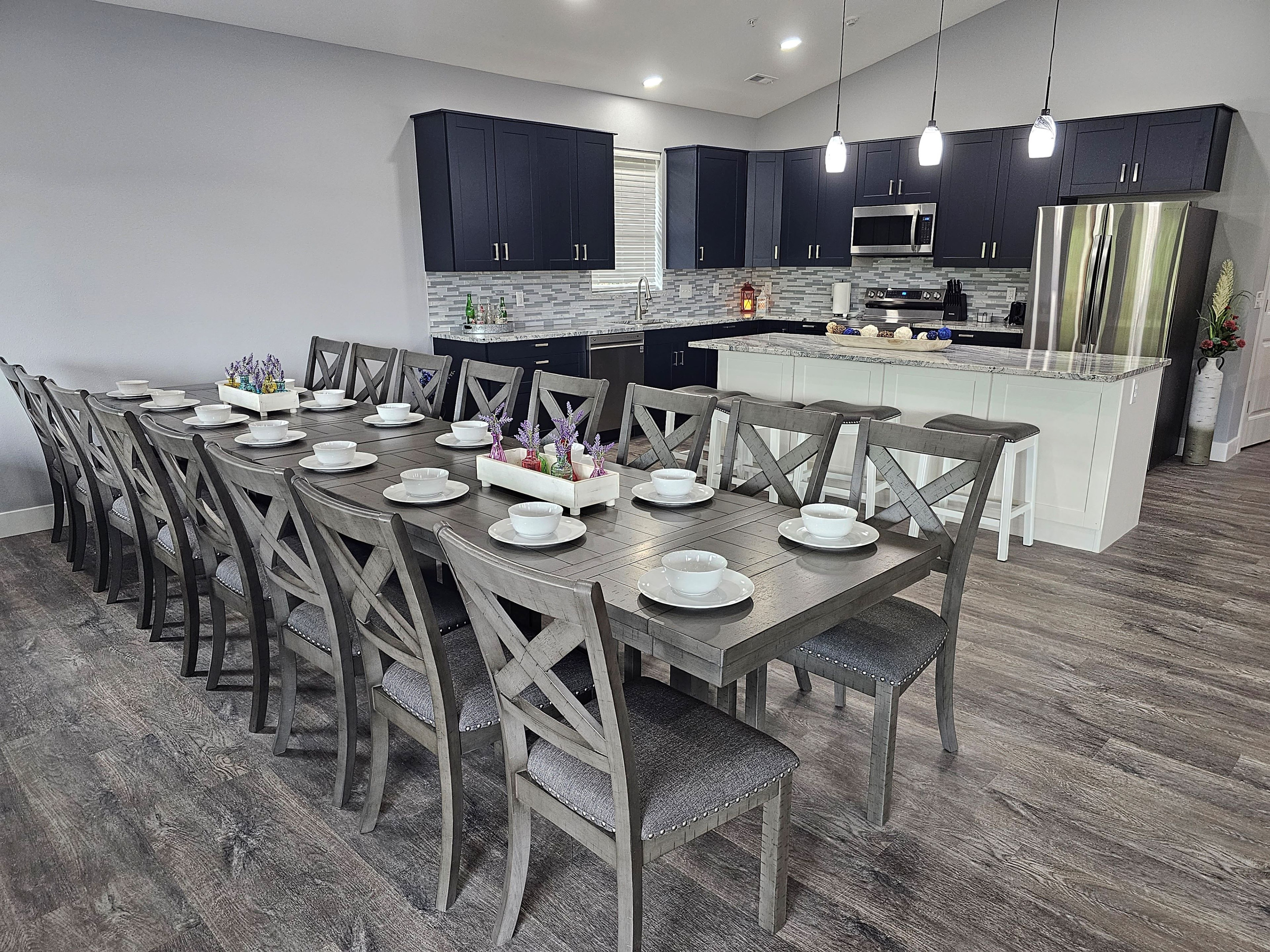 Spacious dining table for shared meals, celebrations, and memories.  Seats 16.