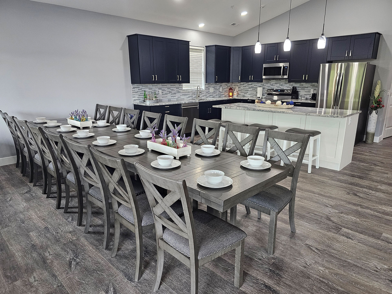 Spacious dining table for shared meals, celebrations, and memories.  Seats 16.