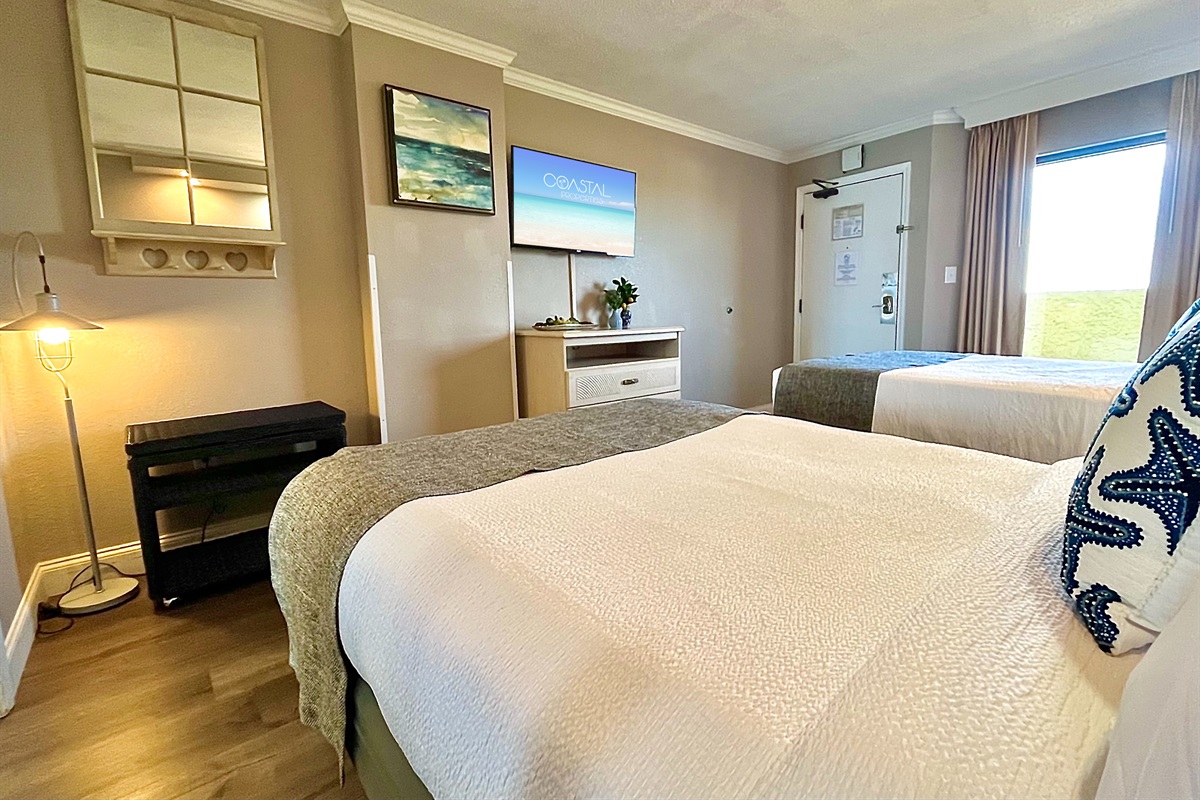 Comfortable bed and inviting bedroom space.