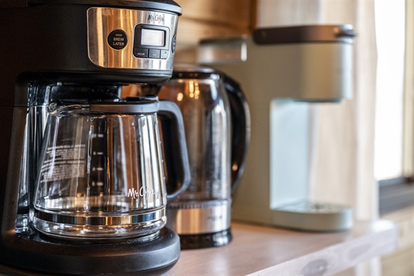 The coffee bar is fully stocked with coffee, and your choice of flavored syrups.