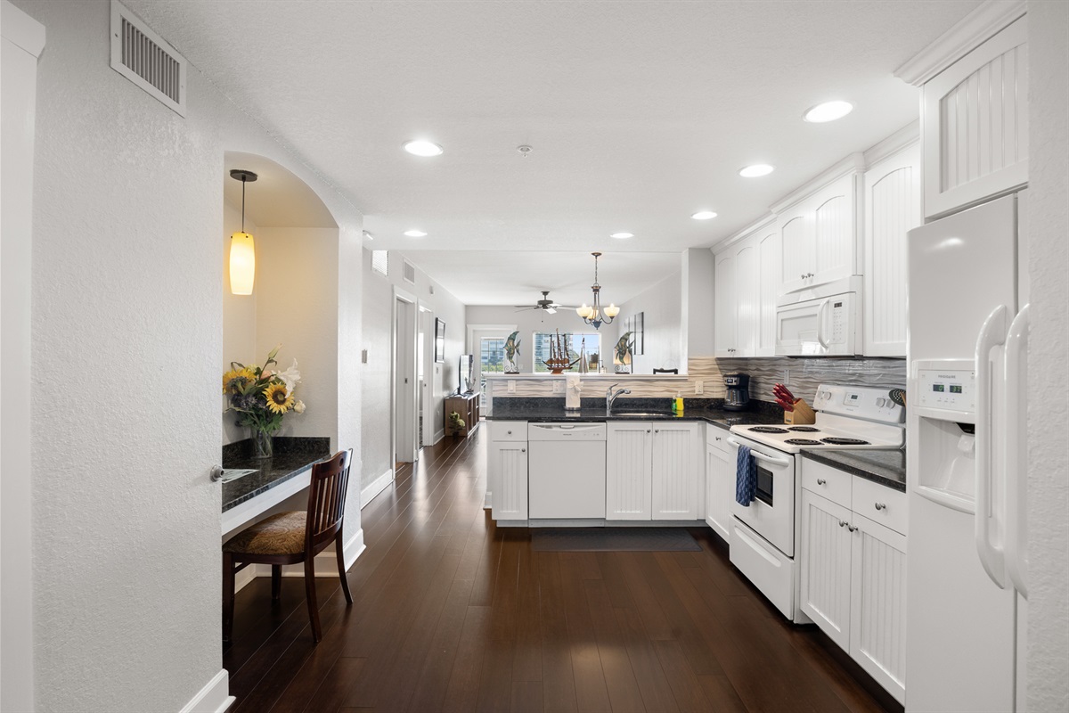 Kitchen, fully stocked with cooking/eating/drinking utensils
