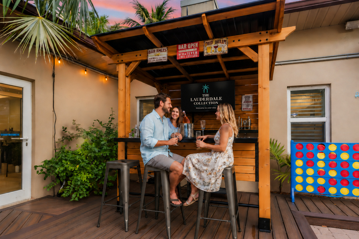 Step into your private entertainment oasis 🍹 — an inviting outdoor bar with a 50” TV, warm lighting, and fun games that set the scene for relaxing and connecting.