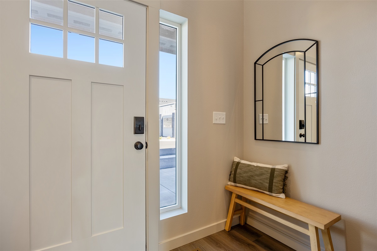 Entryway with mirror and coat hooks