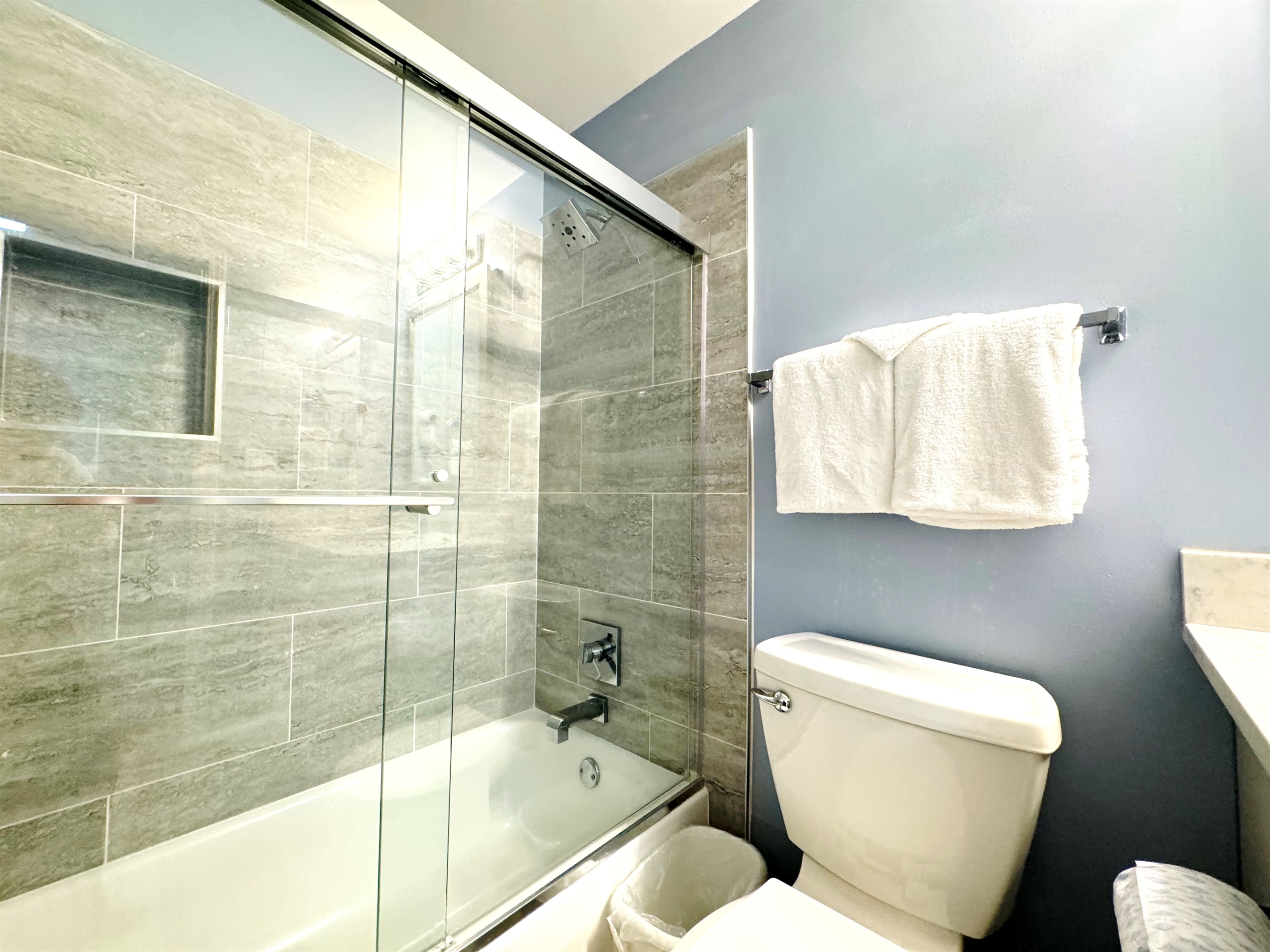 It has a shower and tub.