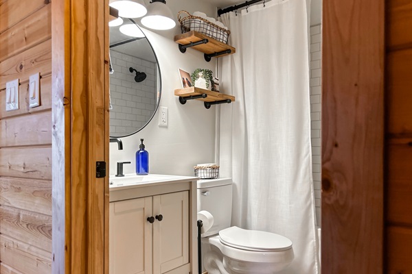 The downstairs bathroom is shared by both rooms on this level.