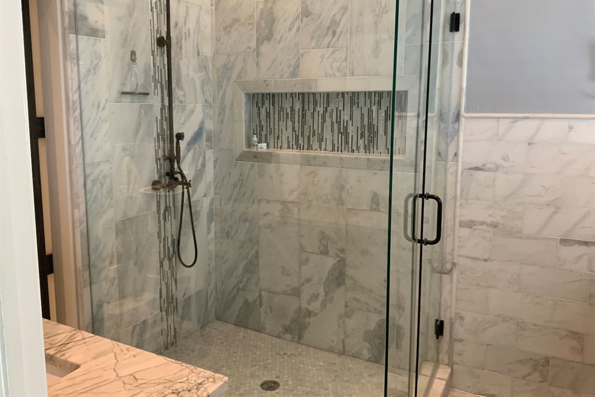 Oversized walk-in shower in master bath.