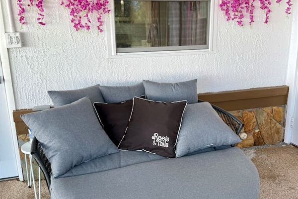 Chill out in style at this trendy Spring Hill Airbnb! Featuring a large outdoor lounging couch, perfect for relaxing or snapping that perfect instagram pic. 
#SpringHillAirbnb #Stylishstay #tropicalvibes