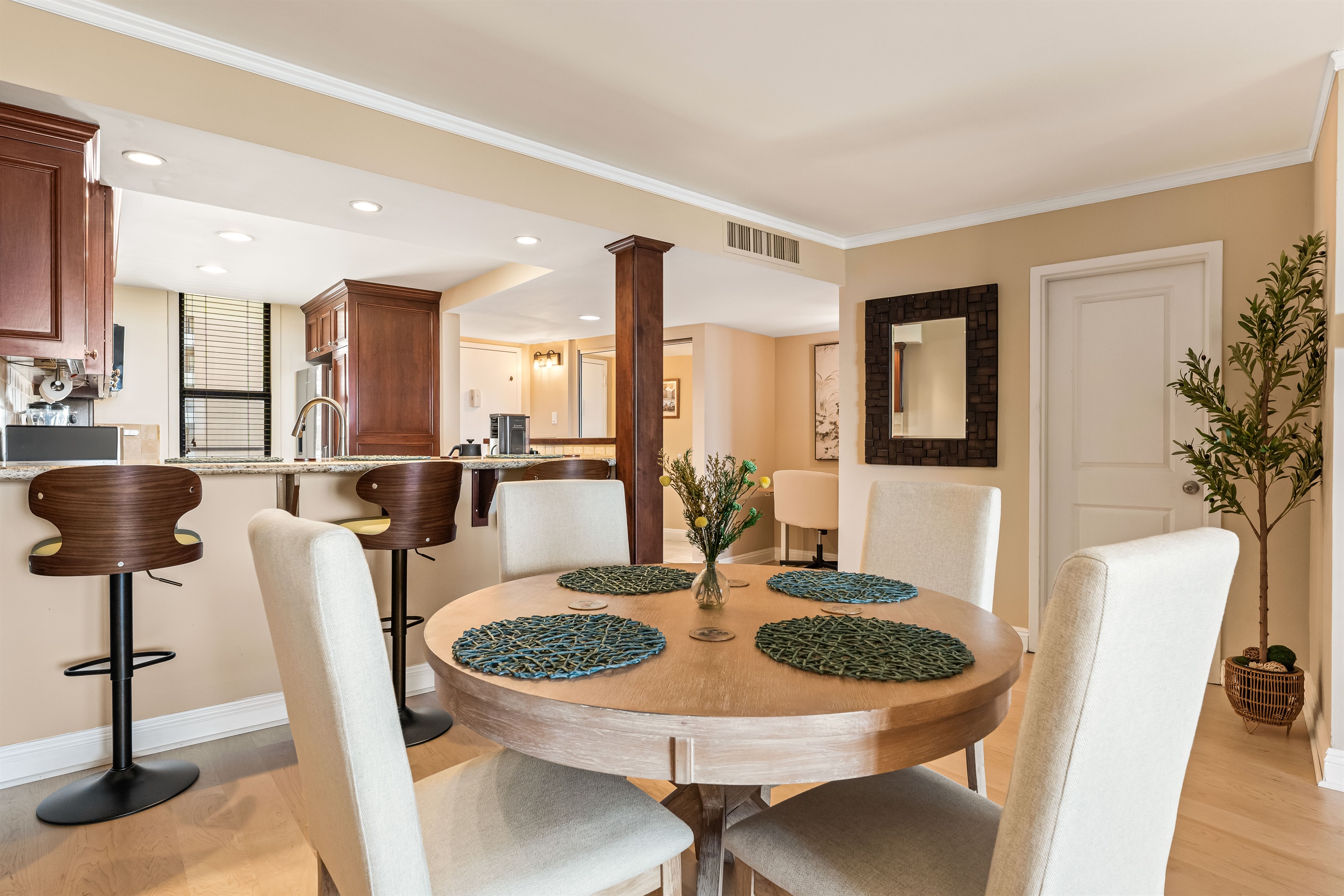 4 seater dining table + 3-seater breakfast bar arrangement