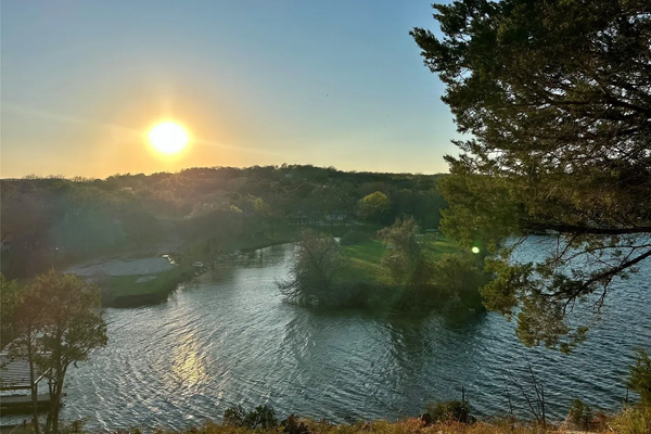 Sunset over the quiet Lake Granbury cove.
