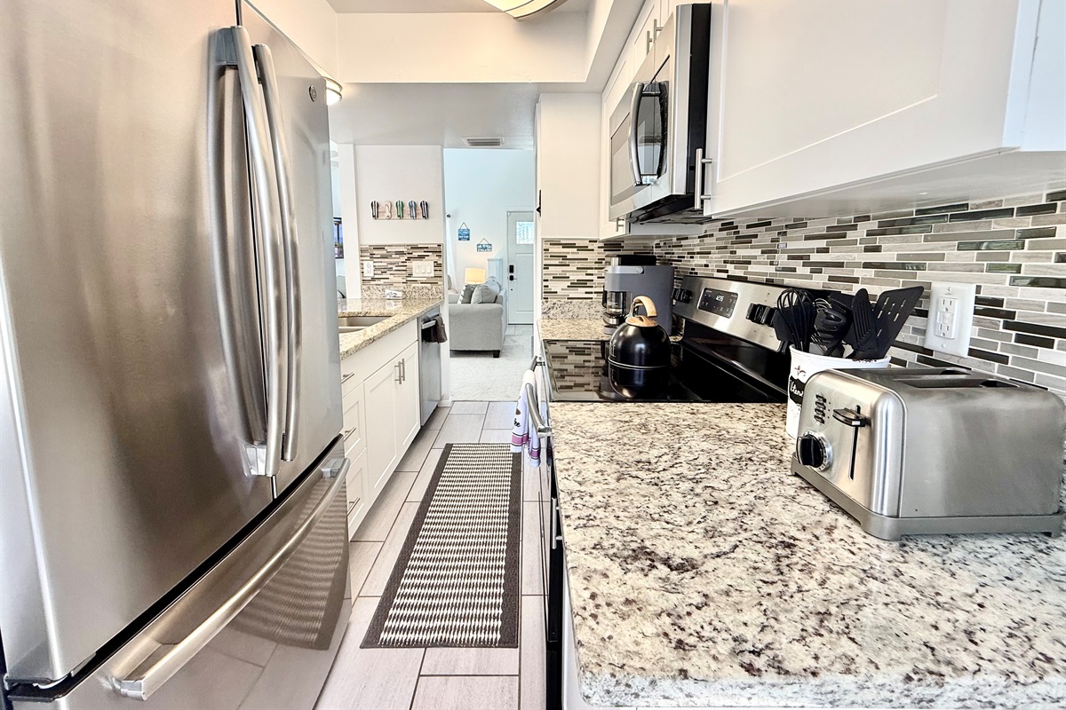 From morning coffee to full dinners, this kitchen has everything you need, including a microwave, toaster, and coffee maker.