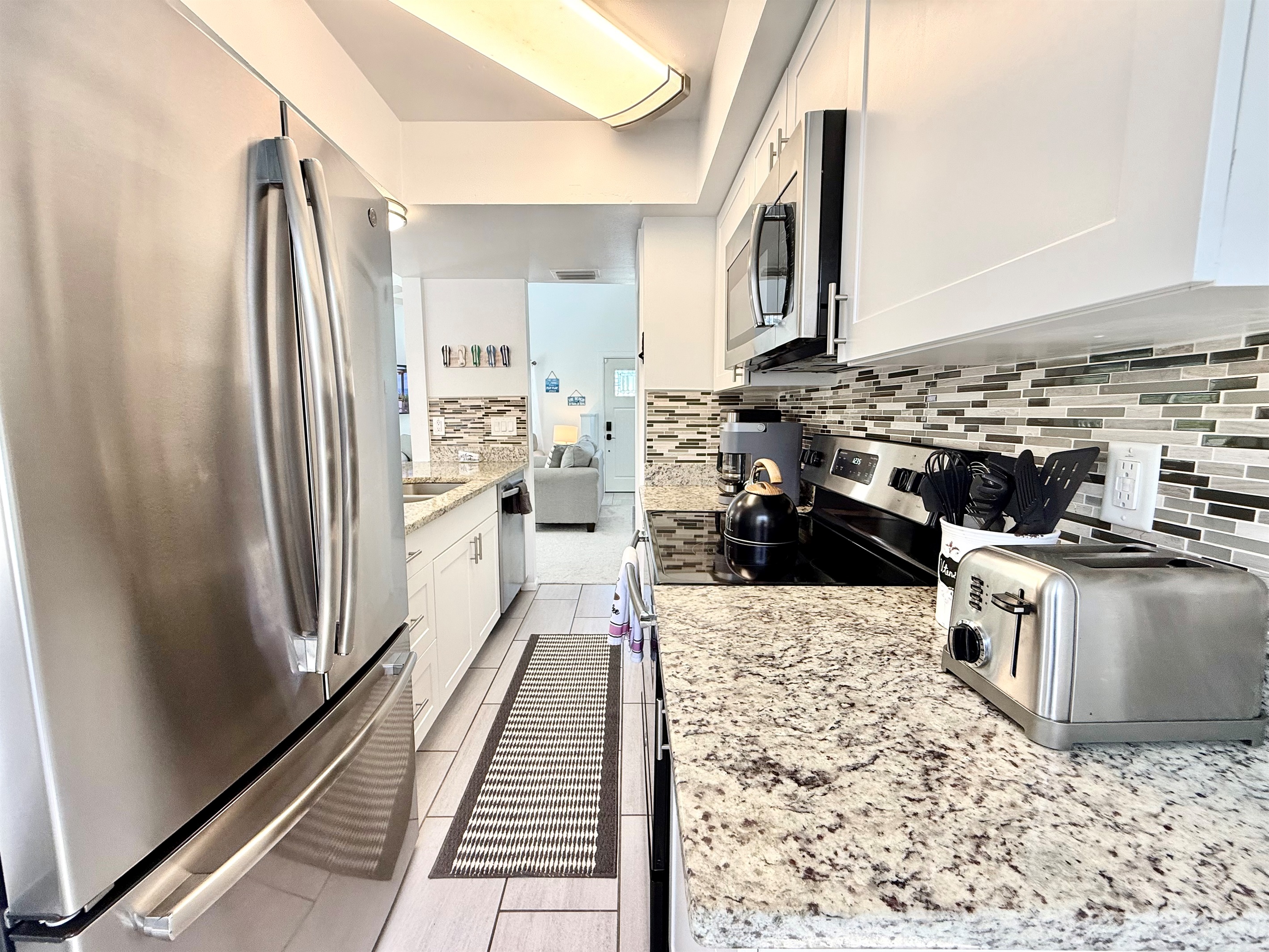 From morning coffee to full dinners, this kitchen has everything you need, including a microwave, toaster, and coffee maker.