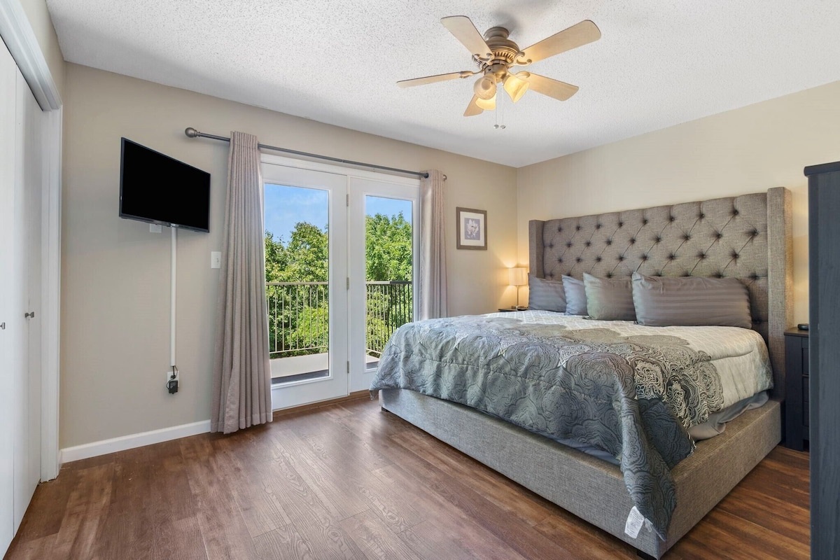 Wake up to sunshine and step onto your private balcony from this serene master suite
