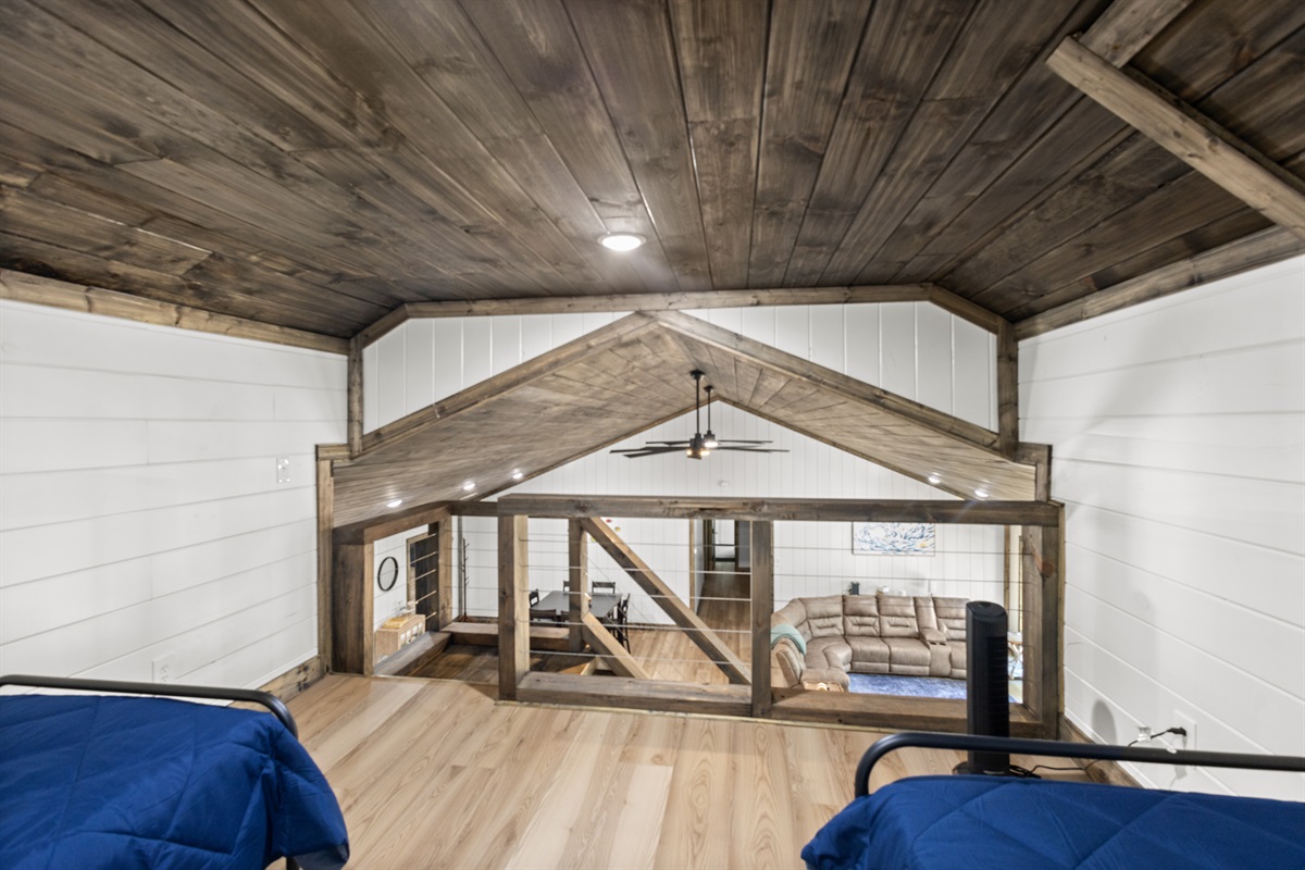 2 Twin Beds and view looking into living room