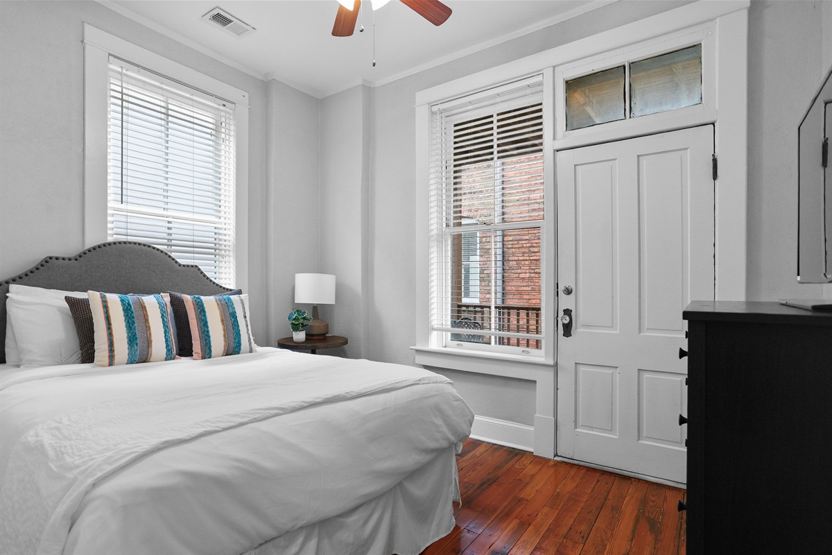 Comfort and style combine in this queen bedroom retreat.