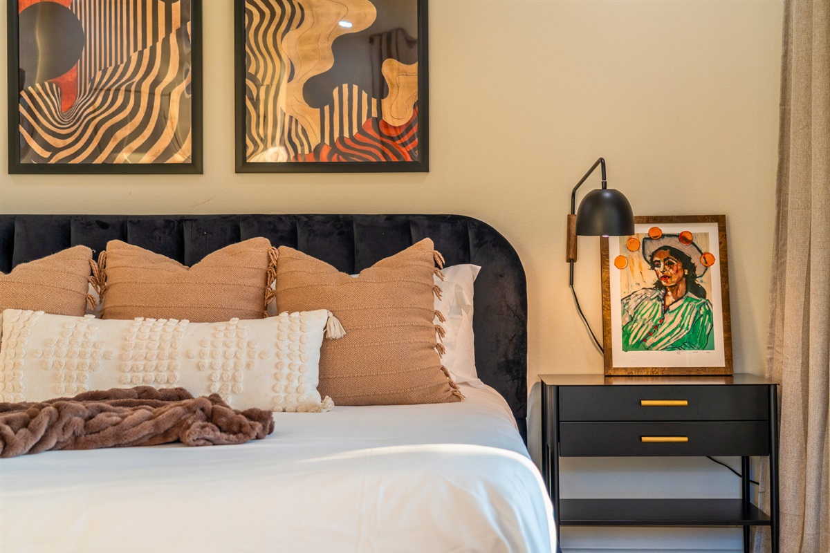 Thoughtfully styled with modern artwork, soft textures, and a relaxing ambiance.