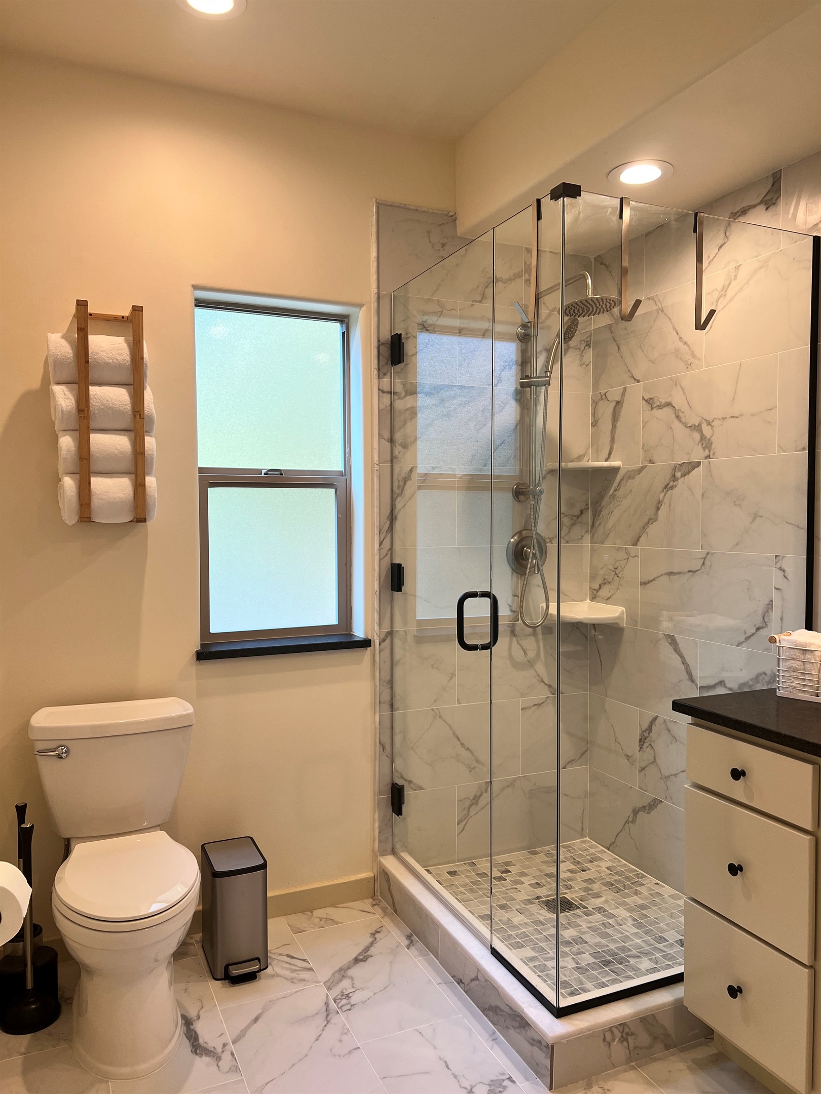 Hot showers on cool mornings in your private hotel-style bathroom.  This shower has both rainfall and handheld shower heads.