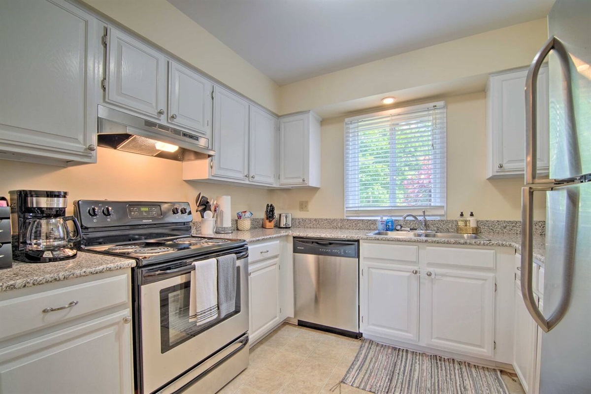 2Bd Unit:  The fully stocked kitchen has granite counter-tops, and stainless-steel appliances including an oven, dishwasher, microwave and a refrigerator with an ice maker. Bakeware, pots and pans, a coffee station, spices and olive oil are provided 