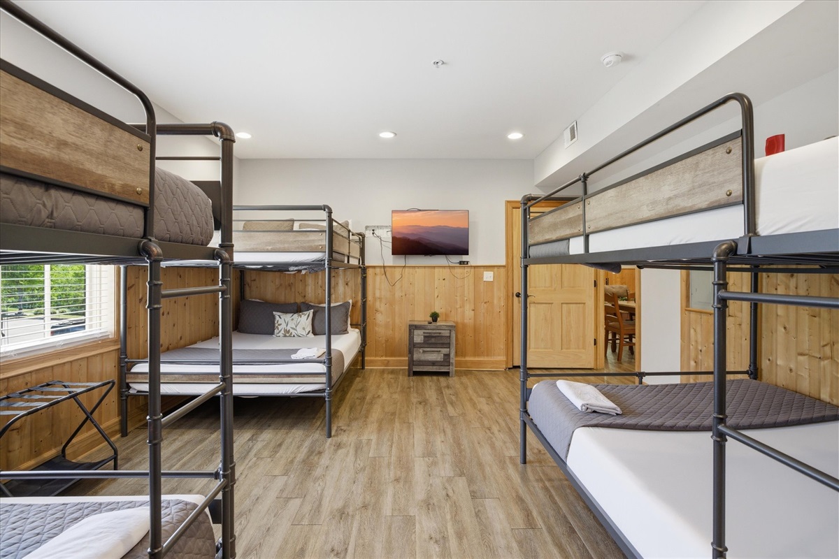 With three queen bunk beds, this room is made for shared moments—plenty of room to spread out, settle in, and wind down after a full day with your crew.