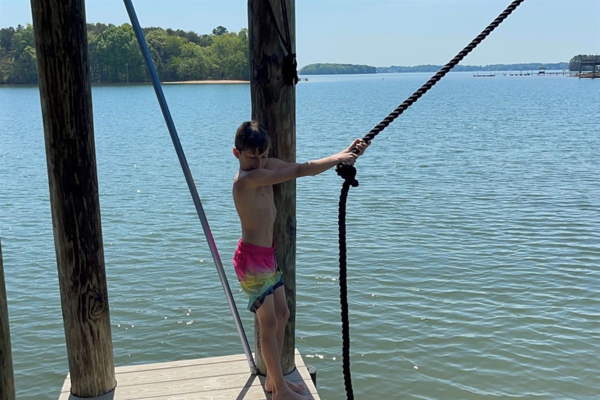 Dock mounted rope swing is ready for you and your guests.