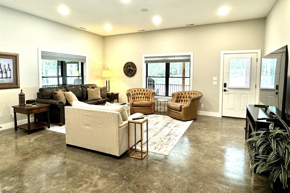 Polished concrete floors and large open concept living.
