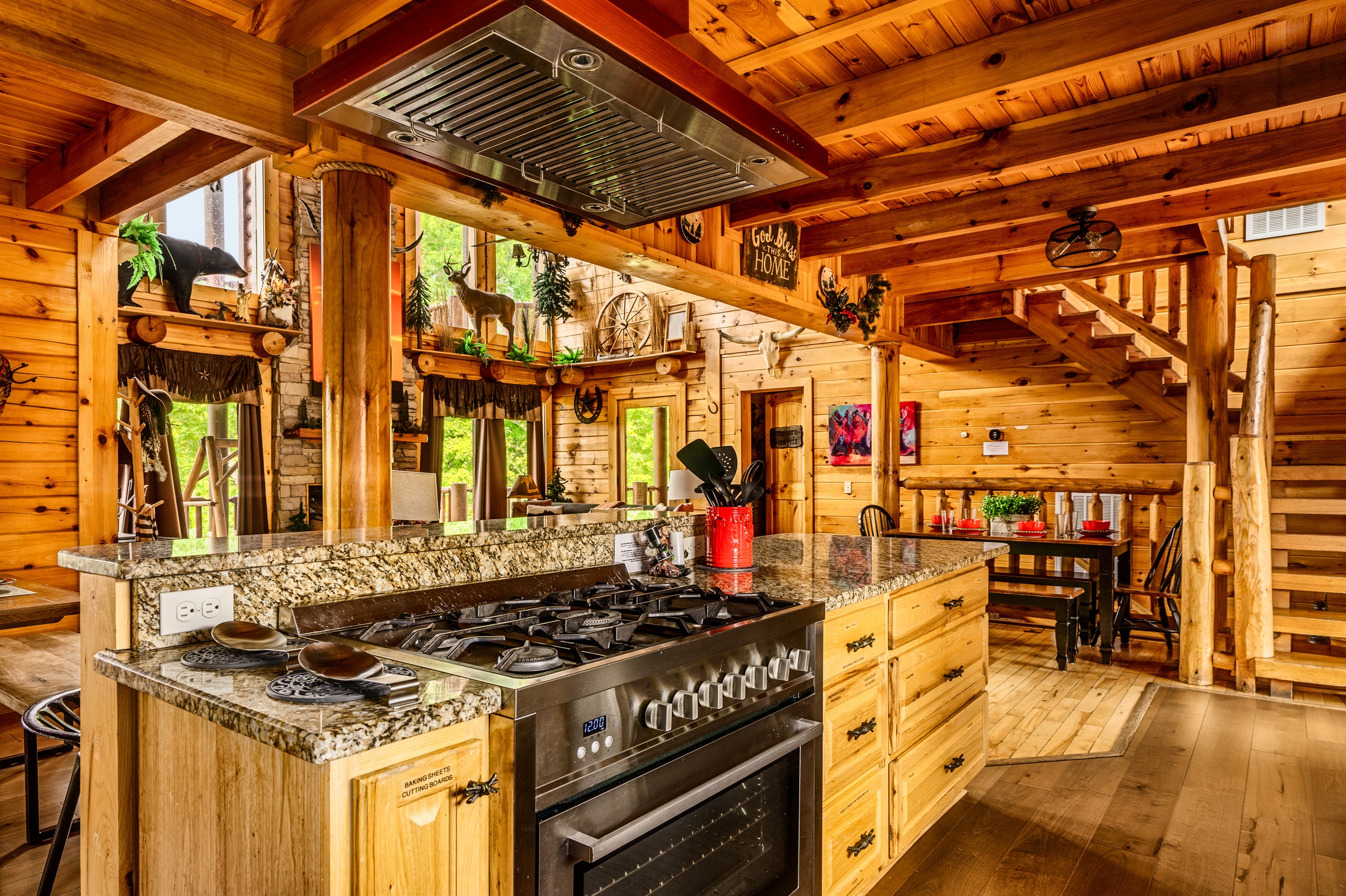 5 burner gas stove, granite counters and floating hood vent.