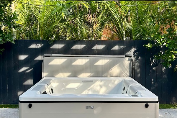 Relax in our newly installed custom Bullfrog spa, nestled beneath a charming pergola and thoughtfully designed for the ultimate in comfort and relaxation. It’s the perfect way to unwind after a day at the beach or a friendly game of bocce!
