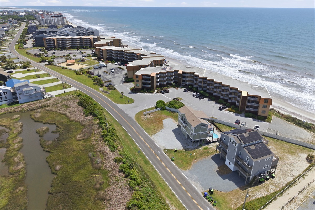 Scenic aerial perspective showcasing the oceanfront community and surrounding coastal landscape