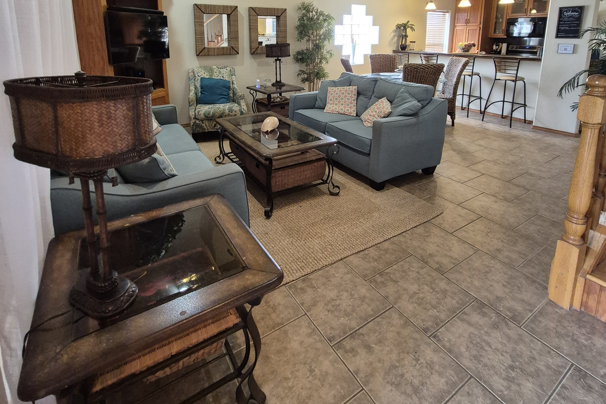 Relax in the open concept living space with entertainment ranging from all your standard electronics (Smart TV with Spectrum TV,  BluRay, device charging station, and stereo system) to classic board/card games and puzzles!