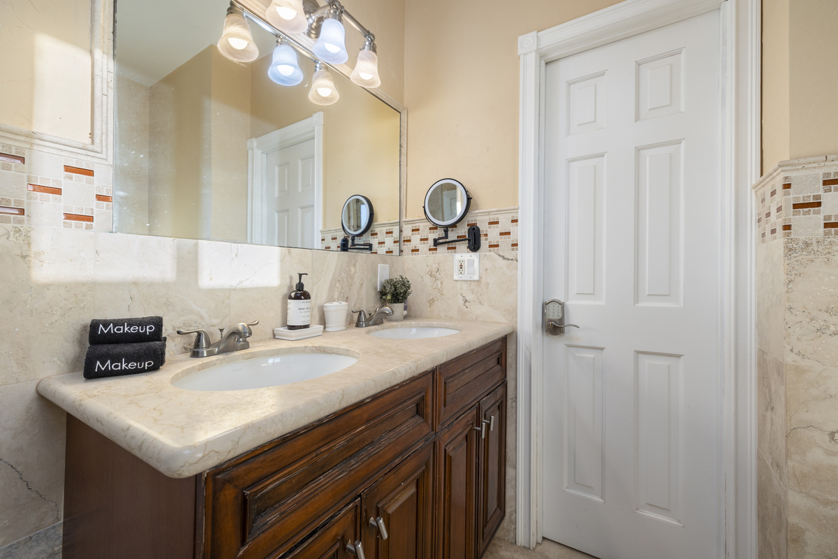 His and her sinks in this ensuite bathroom off the sombrero themed bedroom.