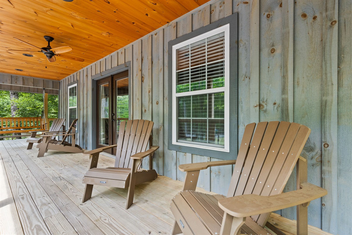 Inviting wrap around porch with ample seating for the entire family.